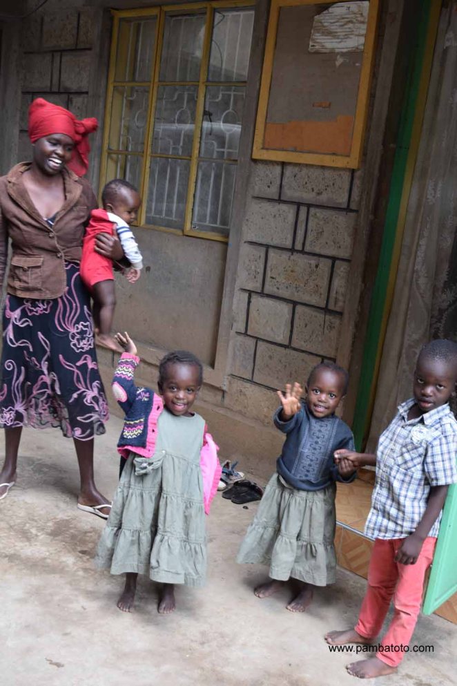 5 Korogocho artisan with children